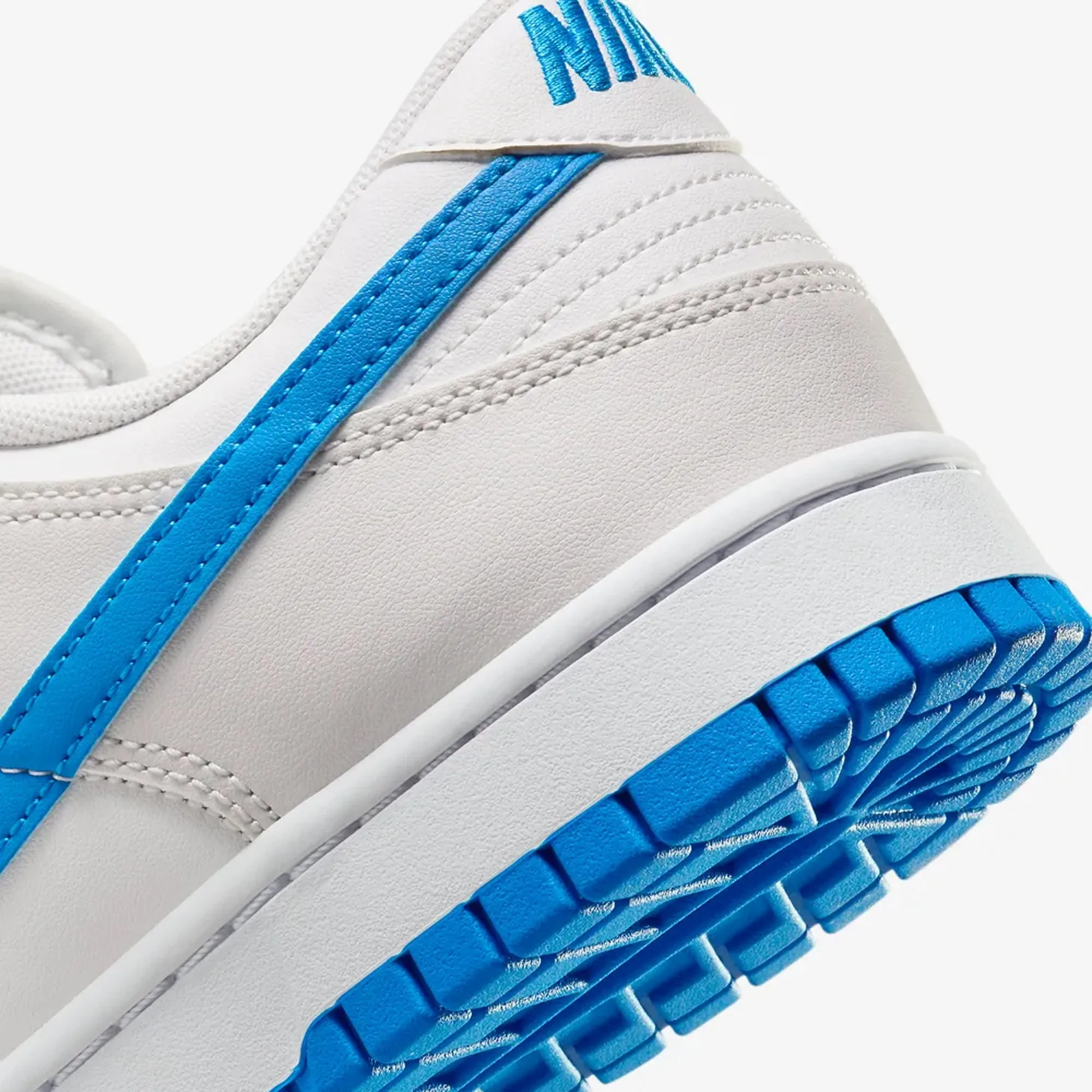 Nike | DUNK LOW RETRO  { SUMMIT WHITE/PHOTO BLUE-PLATINUM TINT